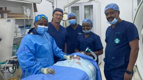 Israeli doctor flies to Rwanda to help save 11-day-old baby
