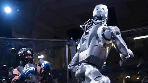 Humanoid robot kicks influencer across ring