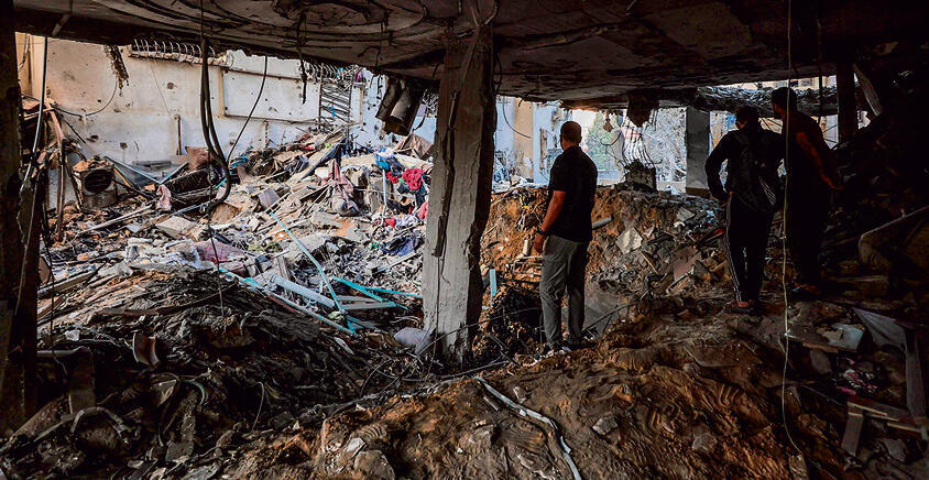 זירת התקיפה בעיר עזה (OMAR AL-QATTAA, AFP) זירת התקיפה בעיר עזה