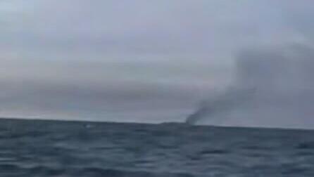Tanker hit by explosives in Strait of Hormuz as Iran claims two vessels disabled
